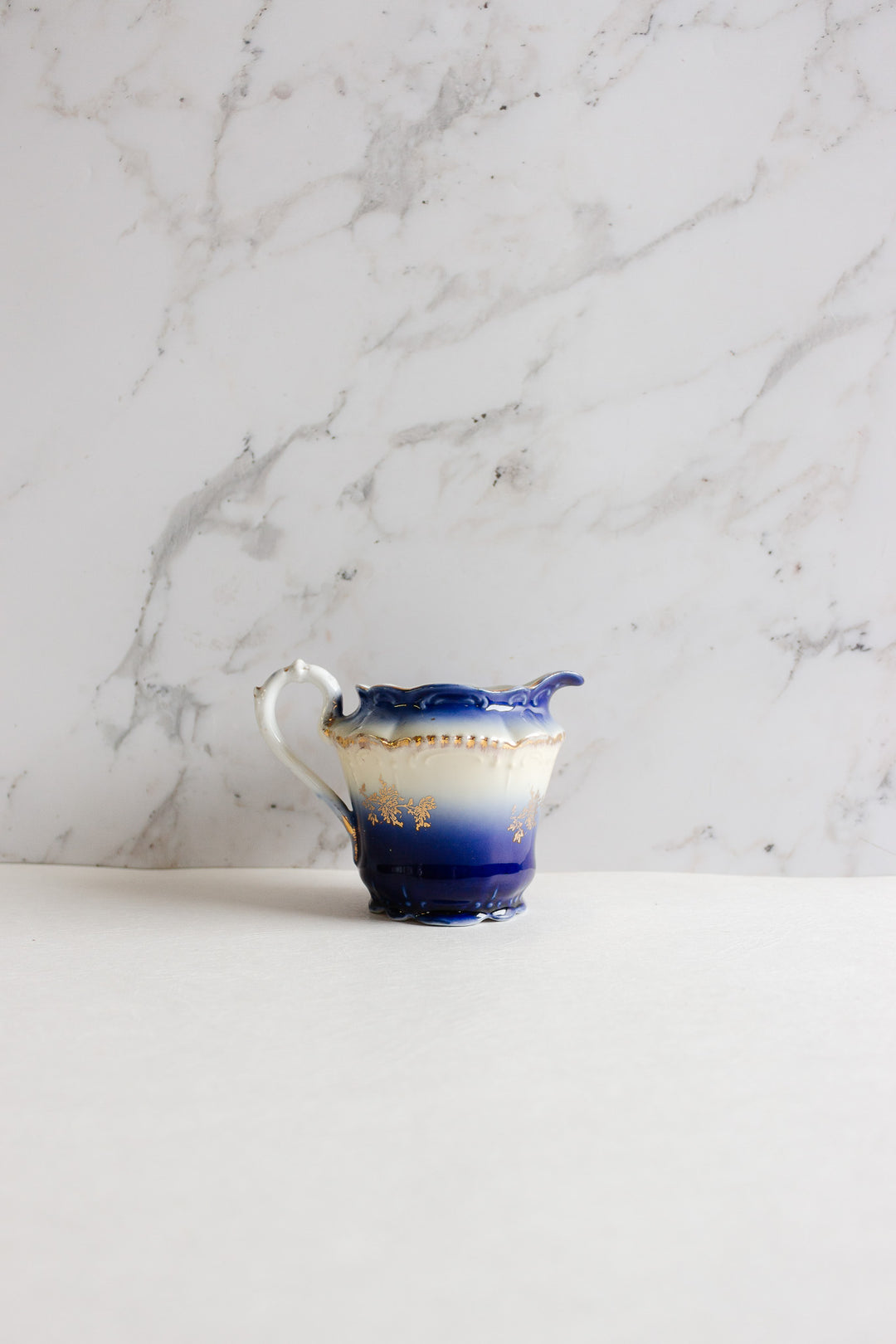 pair of vintage european porcelain creamers