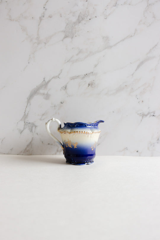 pair of vintage european porcelain creamers