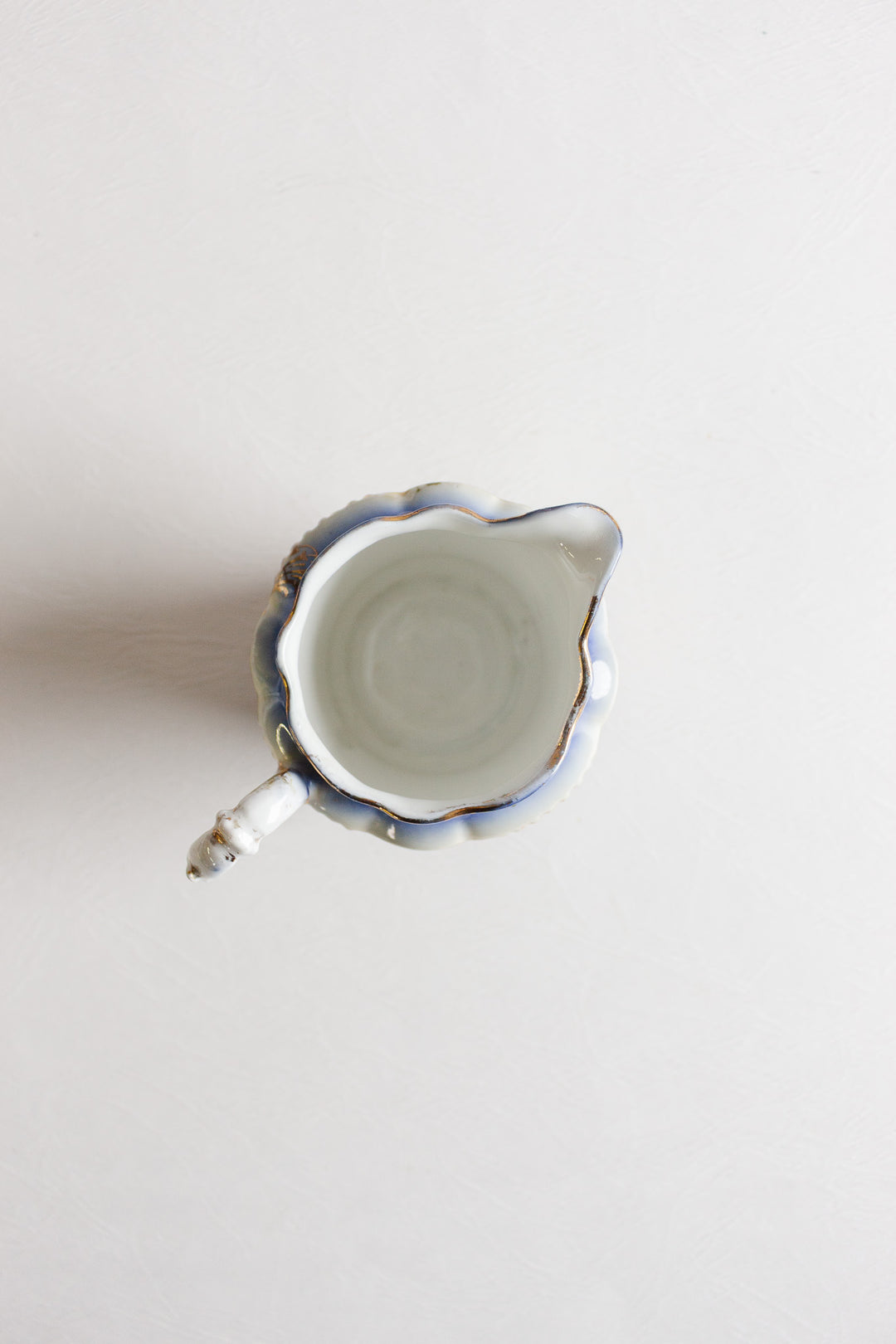 pair of vintage european porcelain creamers