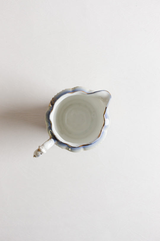 pair of vintage european porcelain creamers