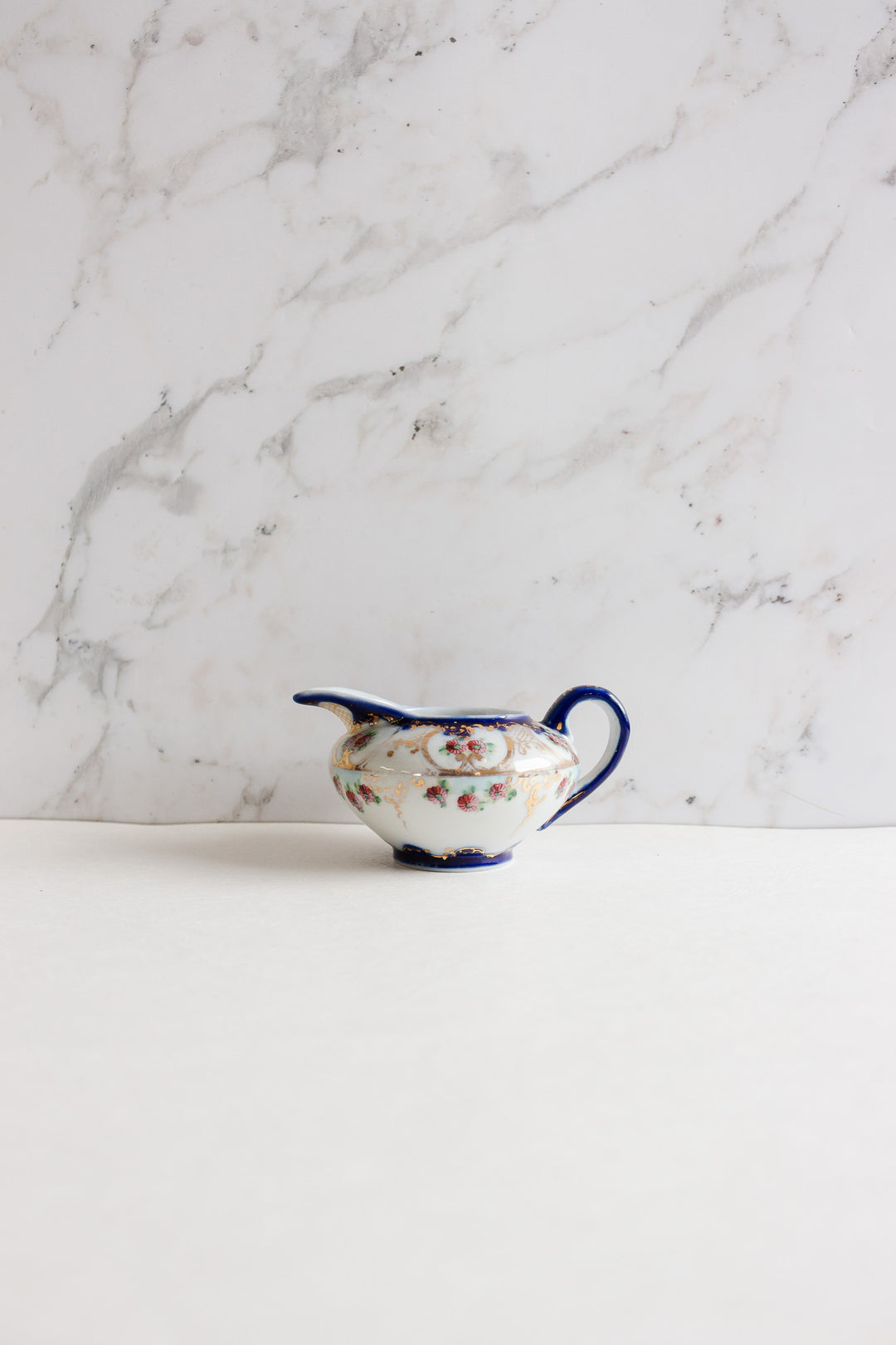 pair of vintage european porcelain creamers