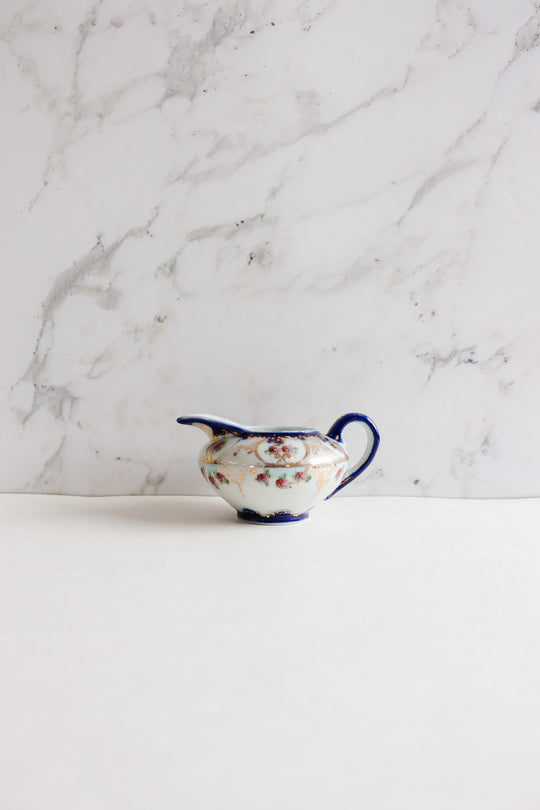 pair of vintage european porcelain creamers