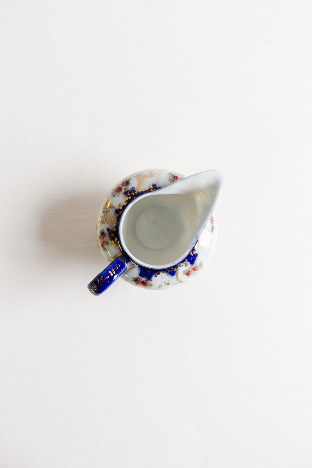 pair of vintage european porcelain creamers