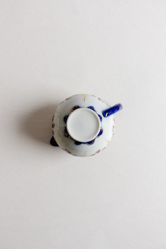 pair of vintage european porcelain creamers