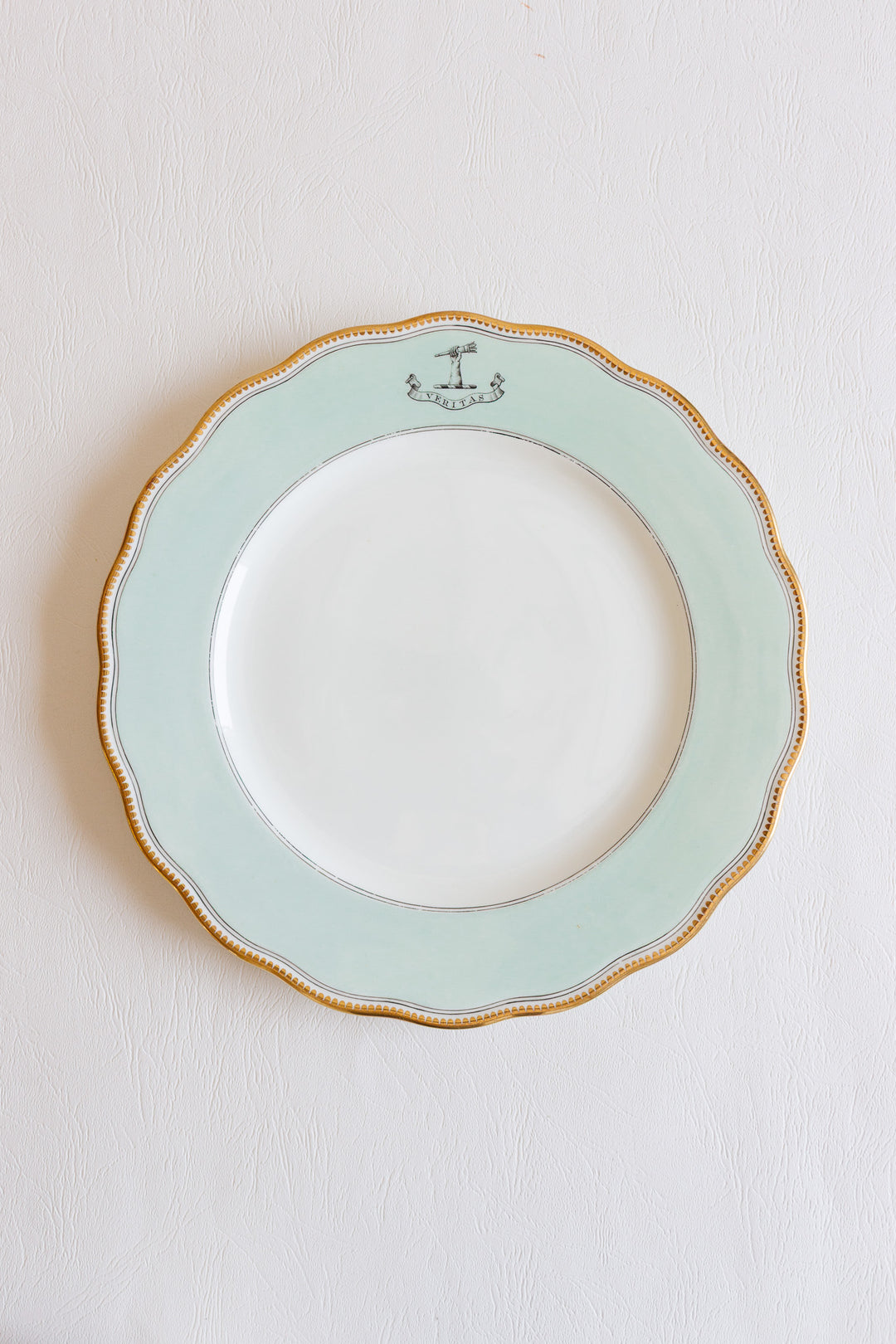 set of 10 antique English, armorial "veritas" scalloped dinner plates