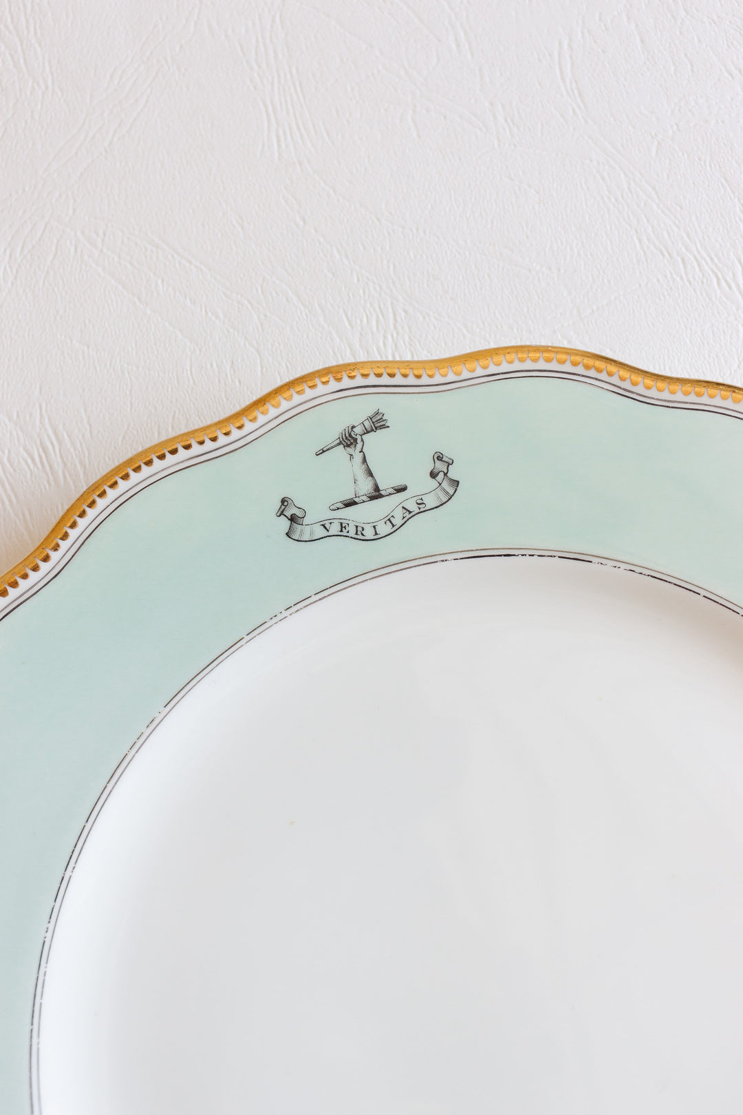 set of 10 antique English, armorial "veritas" scalloped dinner plates