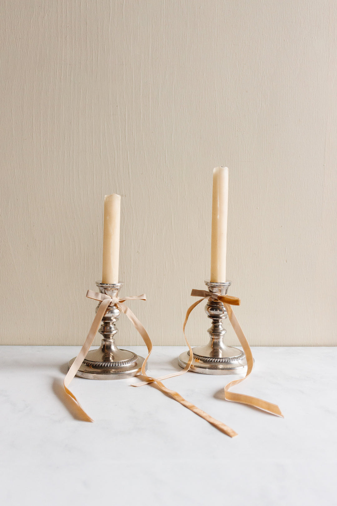 pair of 1930s french stamped silverplate candlesticks