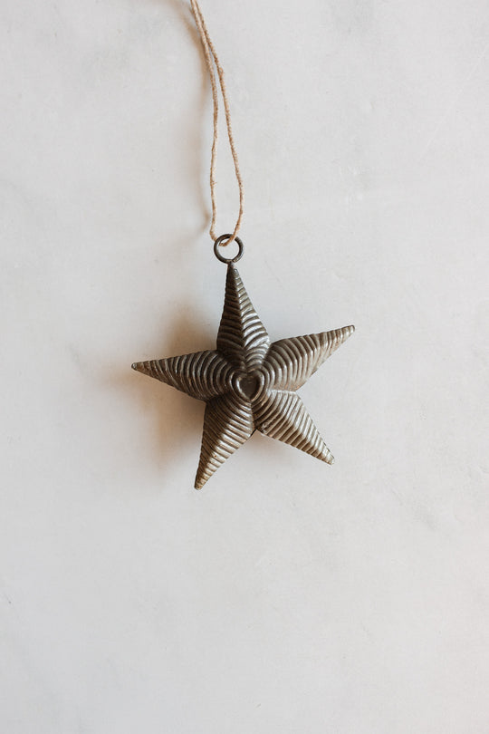 antique german pressed tin star ornament