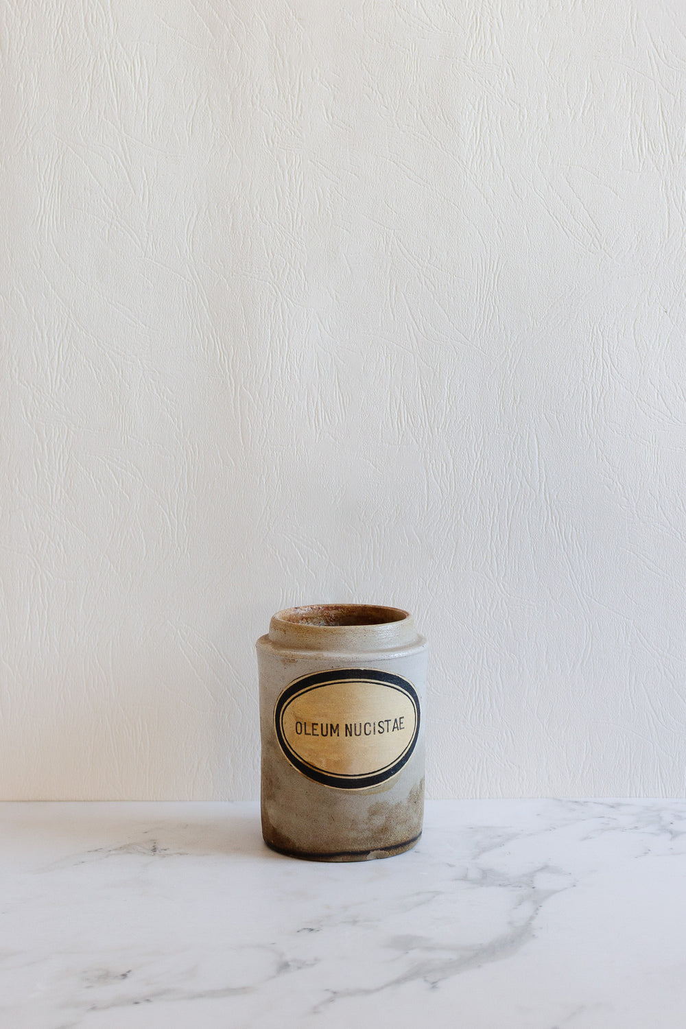 antique "oleum nucistae" stoneware apothecary jar