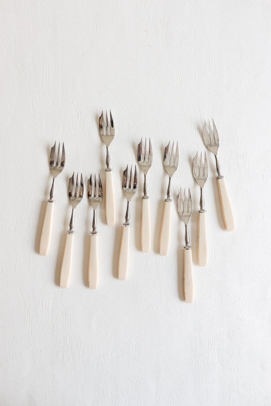 set of 10 vintage pastry forks with ivory-toned handles
