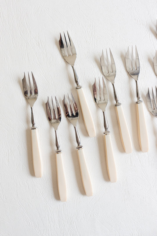 set of 10 vintage pastry forks with ivory-toned handles