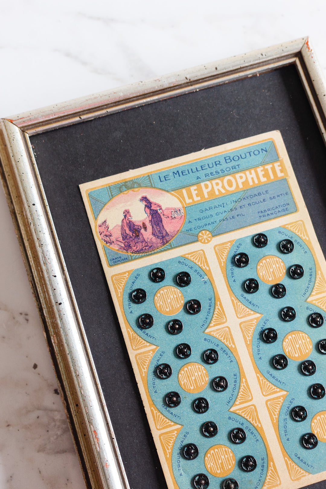 "le prophète" 1920s framed buttons