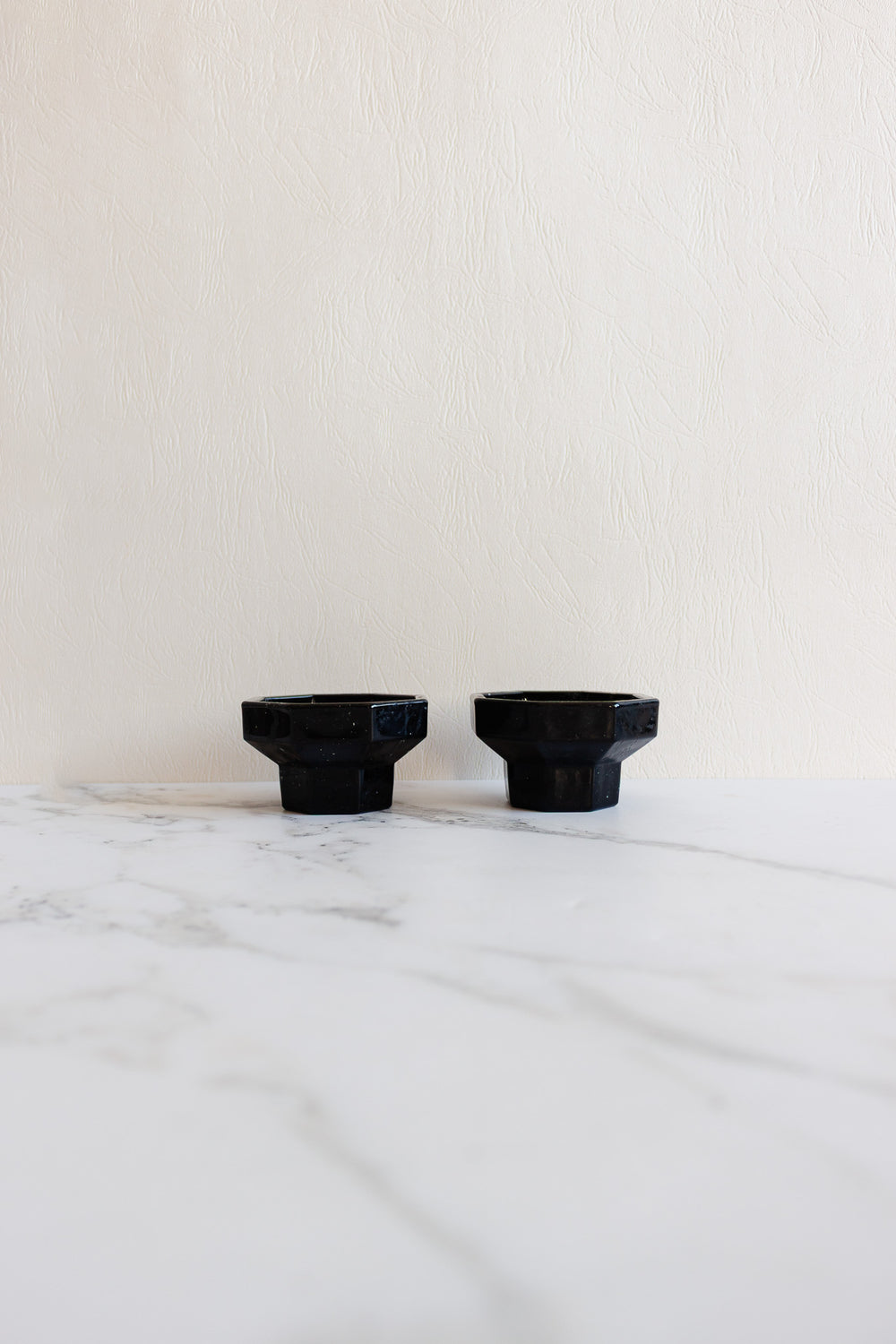 pair of vintage french octime black candleholders