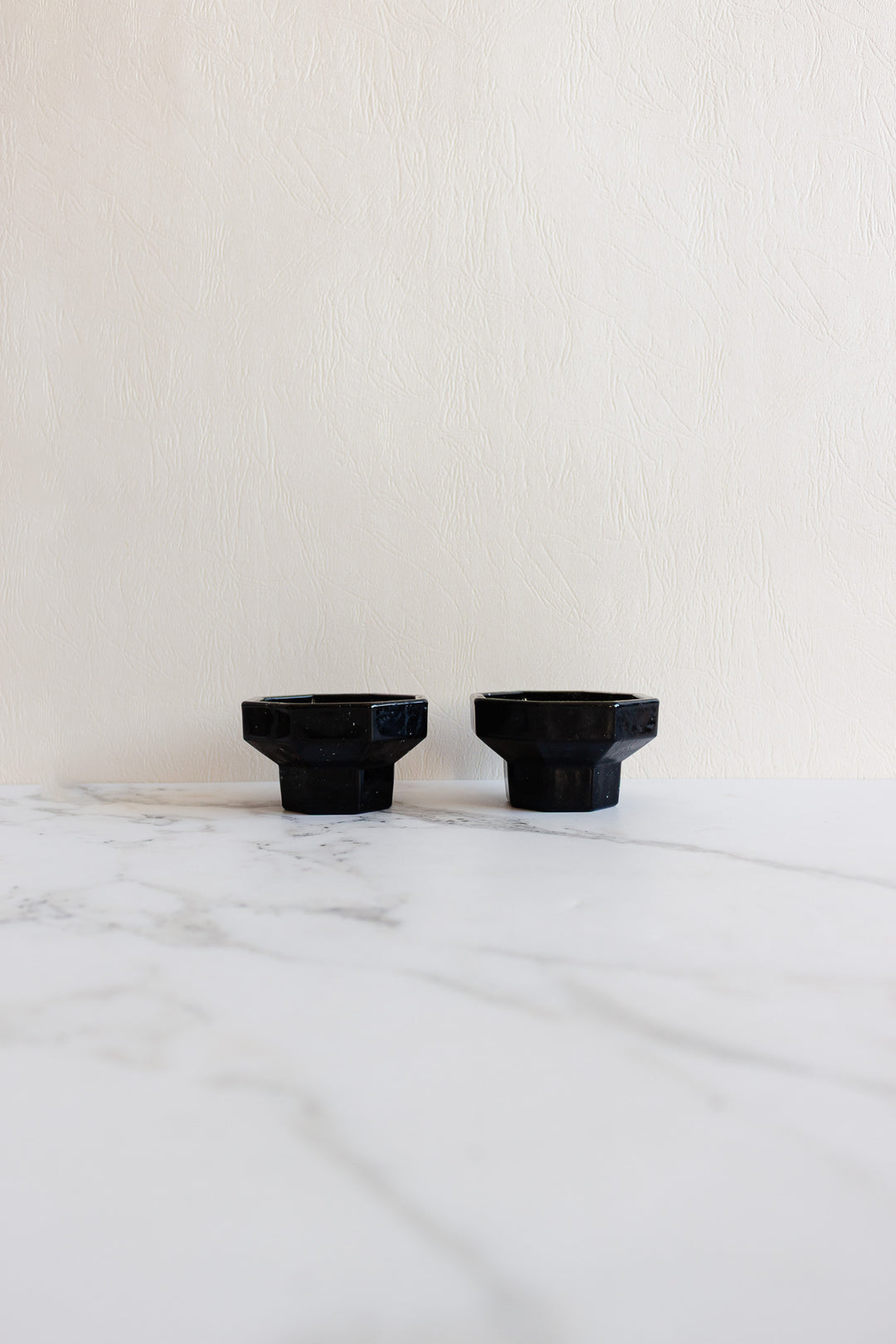pair of vintage french octime black candleholders