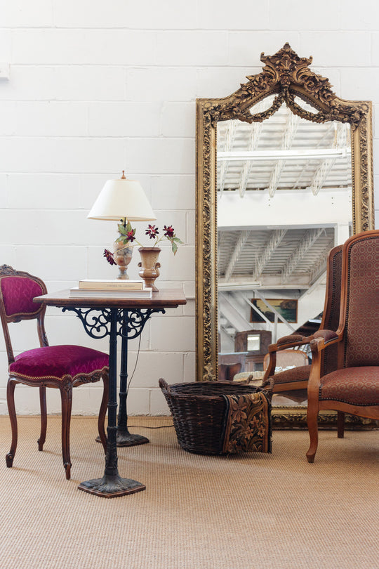 antique french bistro table with cast metal base