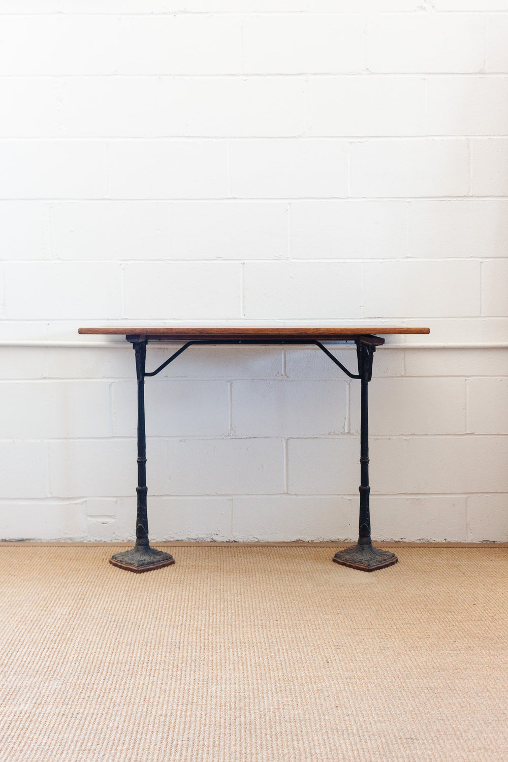 antique french bistro table with cast metal base