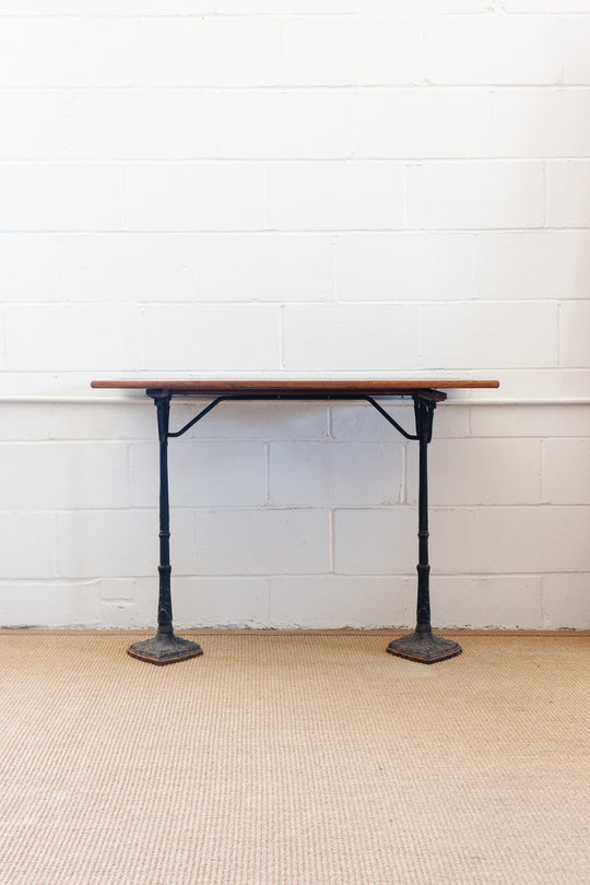 antique french bistro table with cast metal base