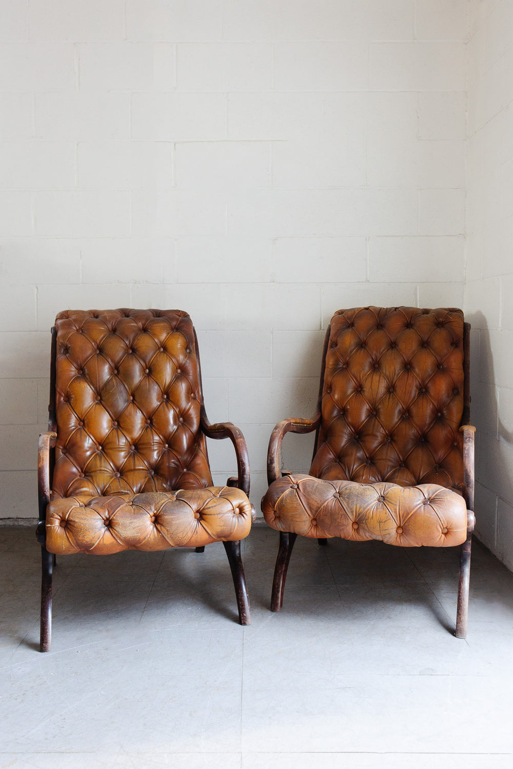 vintage English tufted leather armchair
