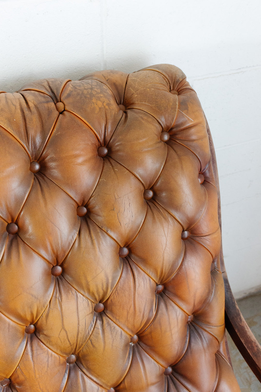 vintage English tufted leather armchair