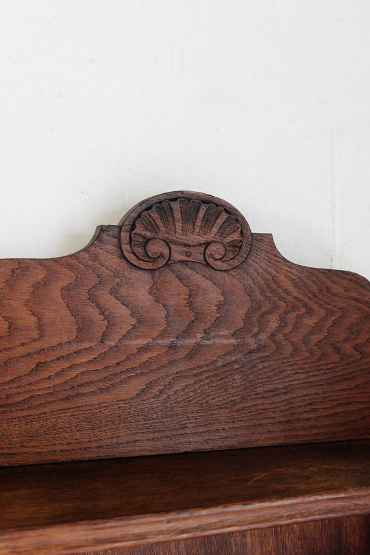 vintage french dark stained wood shelf with scalloped arch