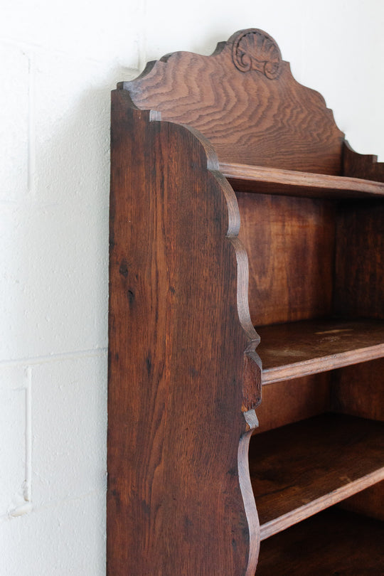 vintage french dark stained wood shelf with scalloped arch