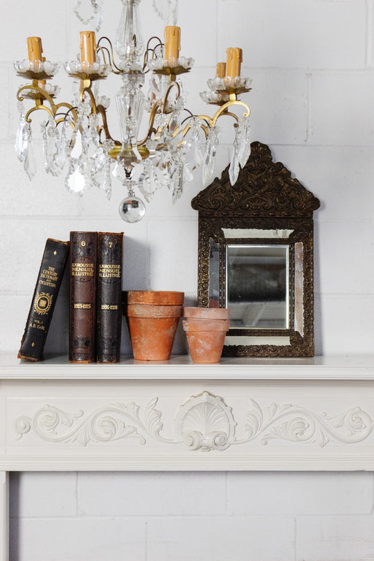 antique french repousse mirror with beveled glass