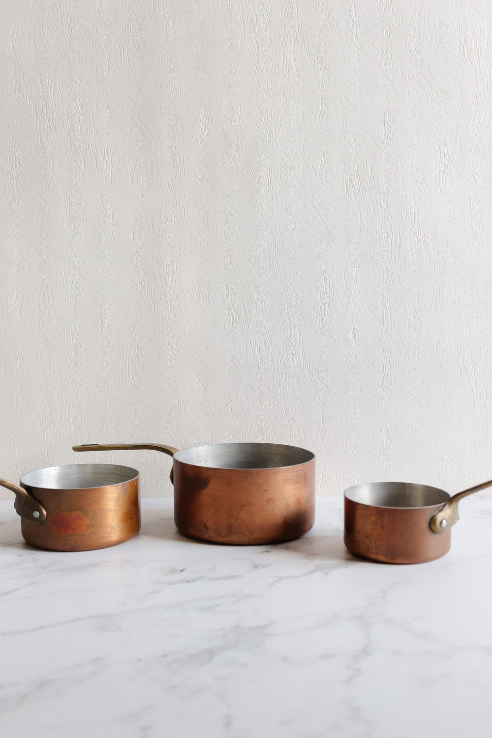 vintage french trio of small copper pots