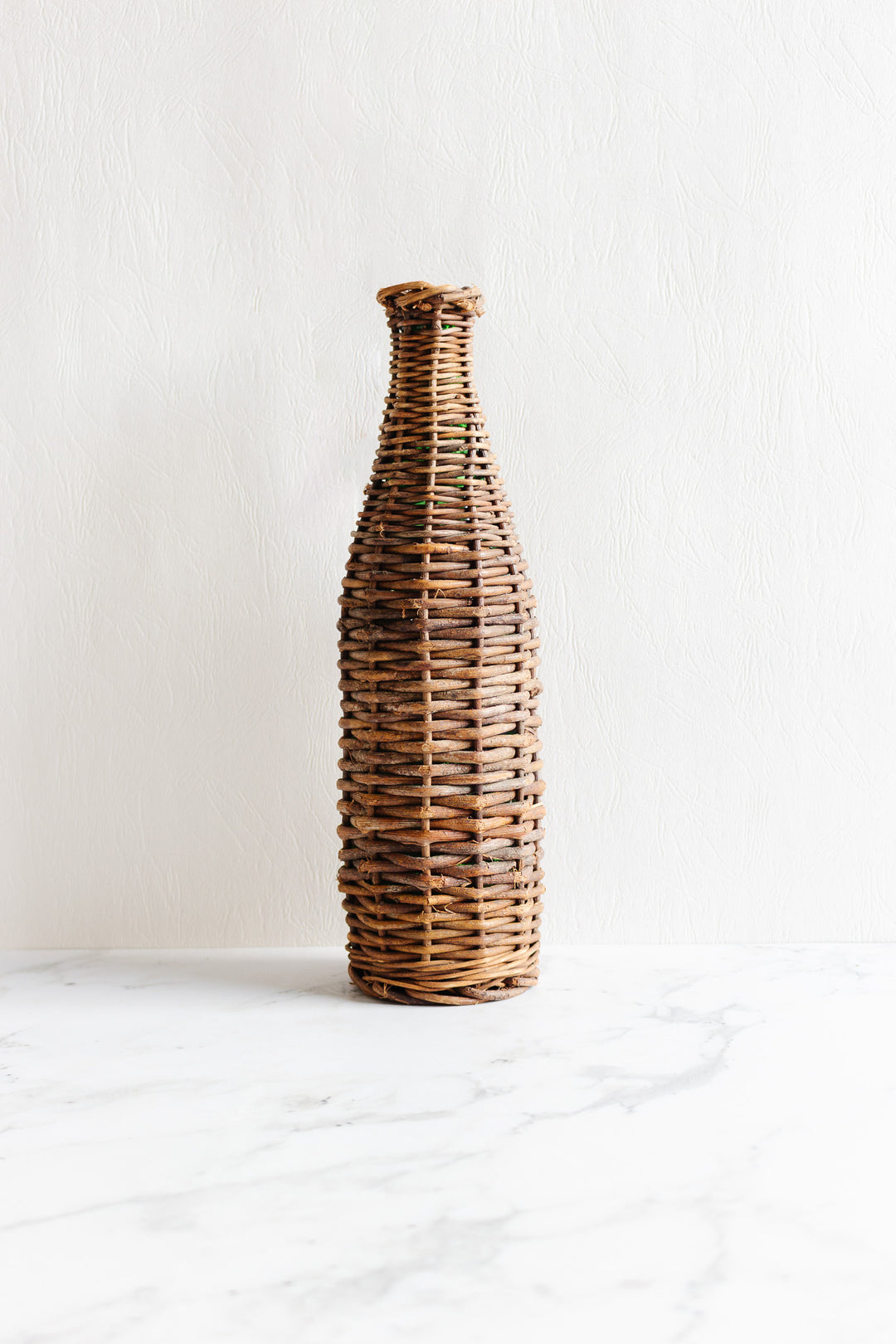 vintage french wicker wrapped bottle