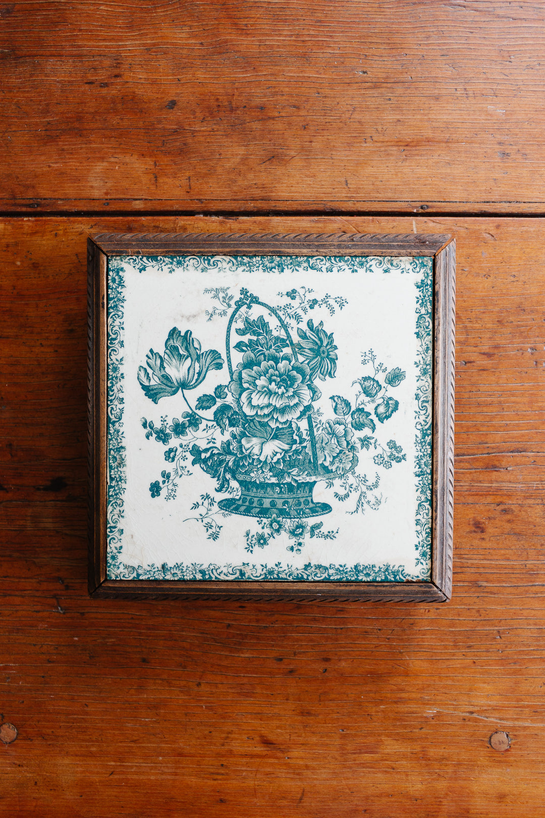 antique french Gien transferware "dessous plat" with carved wood frame