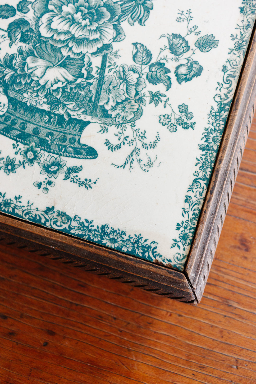 antique french Gien transferware "dessous plat" with carved wood frame