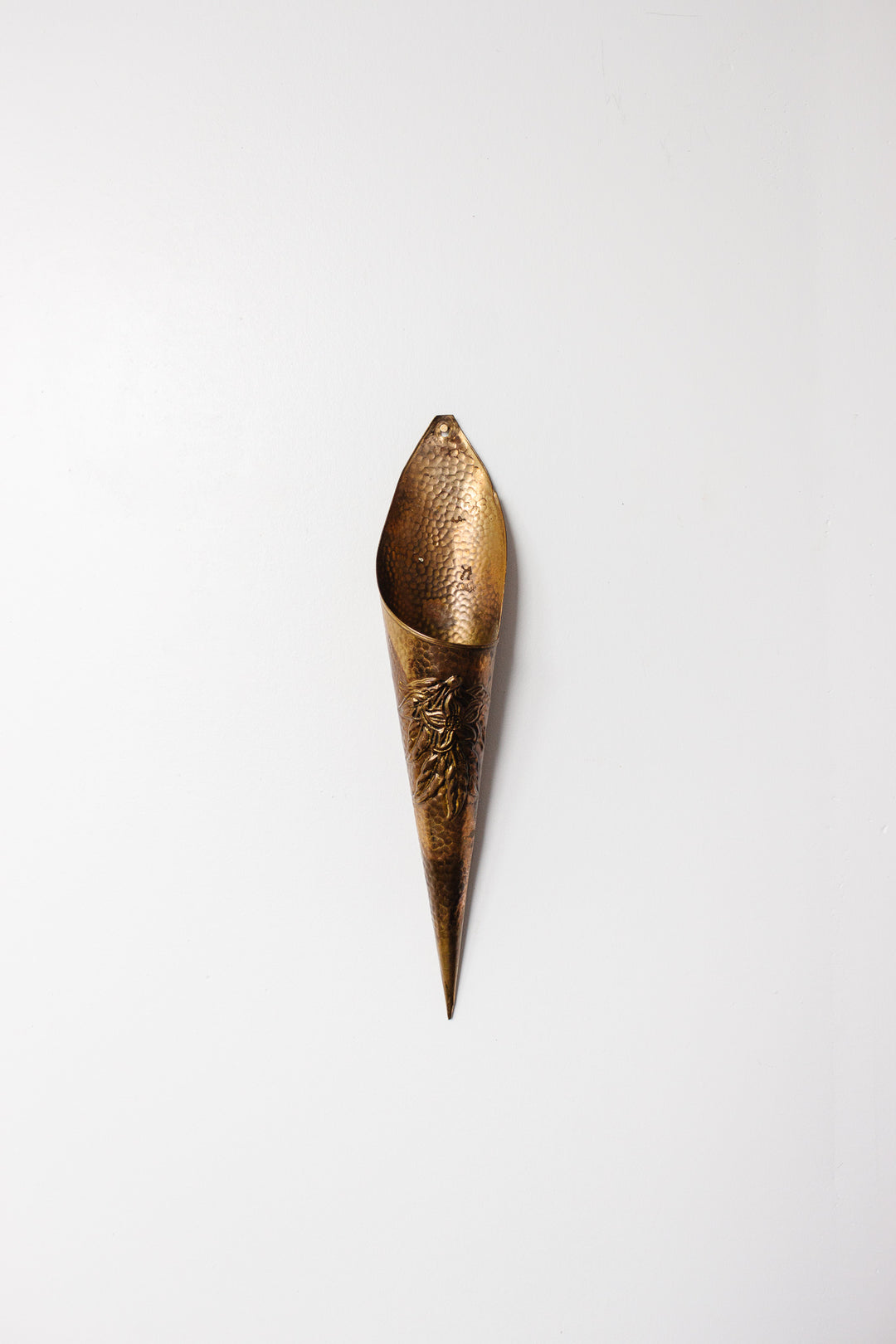 pair of vintage hammered brass wall pockets