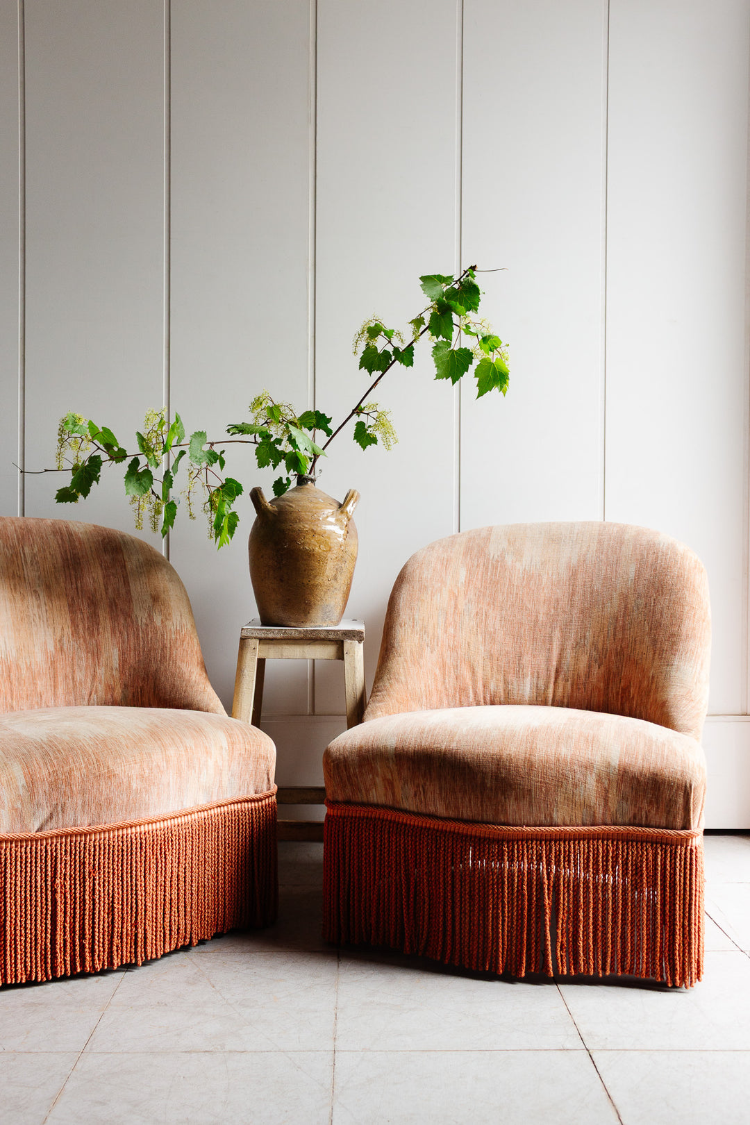 pair of vintage french pink crapaud chairs with fringe