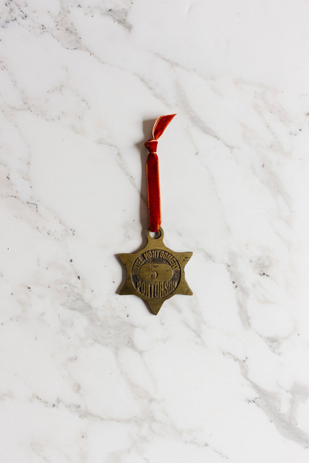 rare 1920s "hotel montgomery" étoile brass key fob