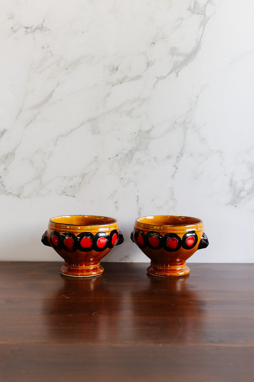 pair of vintage french poët-laval footed bowls