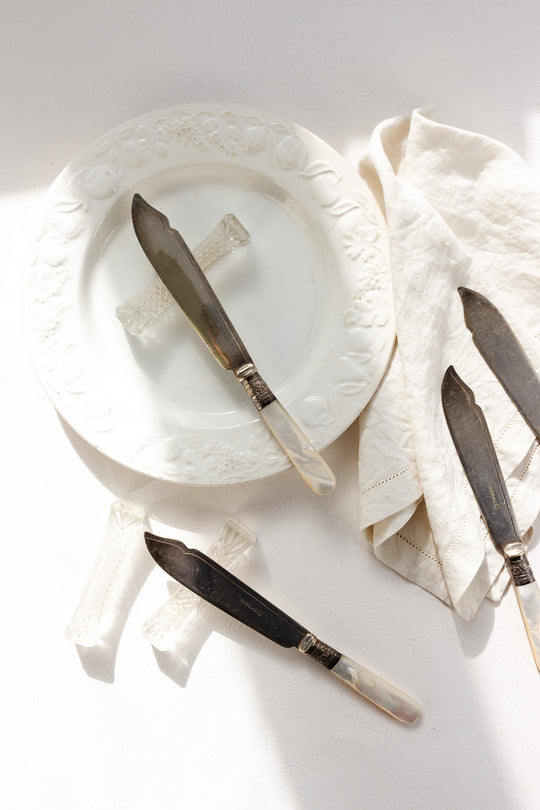 set of vintage french cut glass knife rests