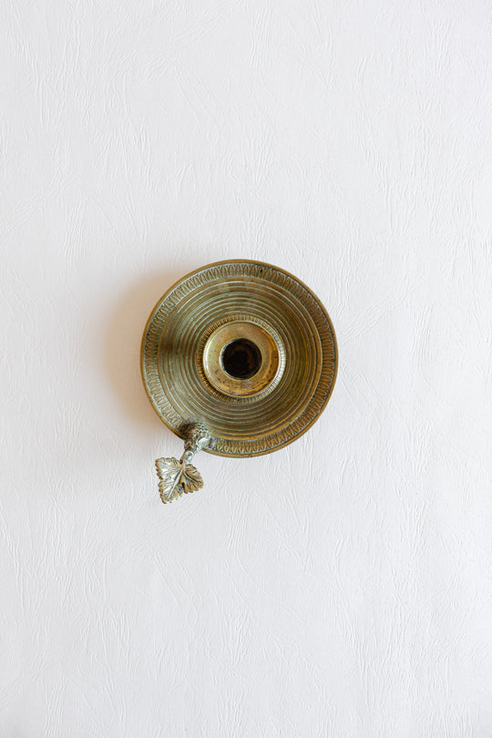 antique french brass chamberstick with leaf shaped handle