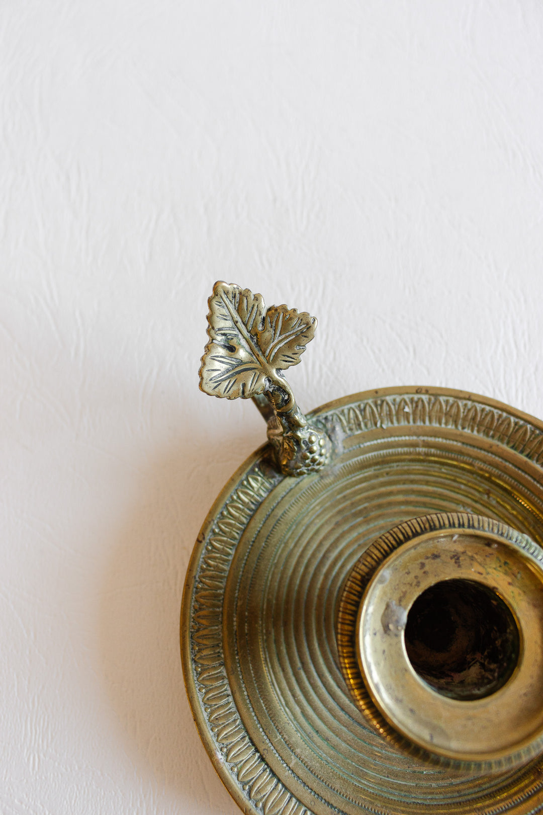 antique french brass chamberstick with leaf shaped handle