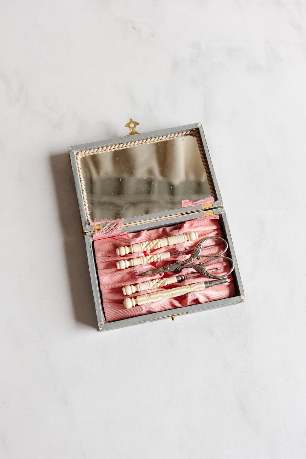 antique french ivory sewing kit in mirrored box
