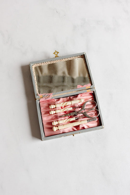 antique french ivory sewing kit in mirrored box