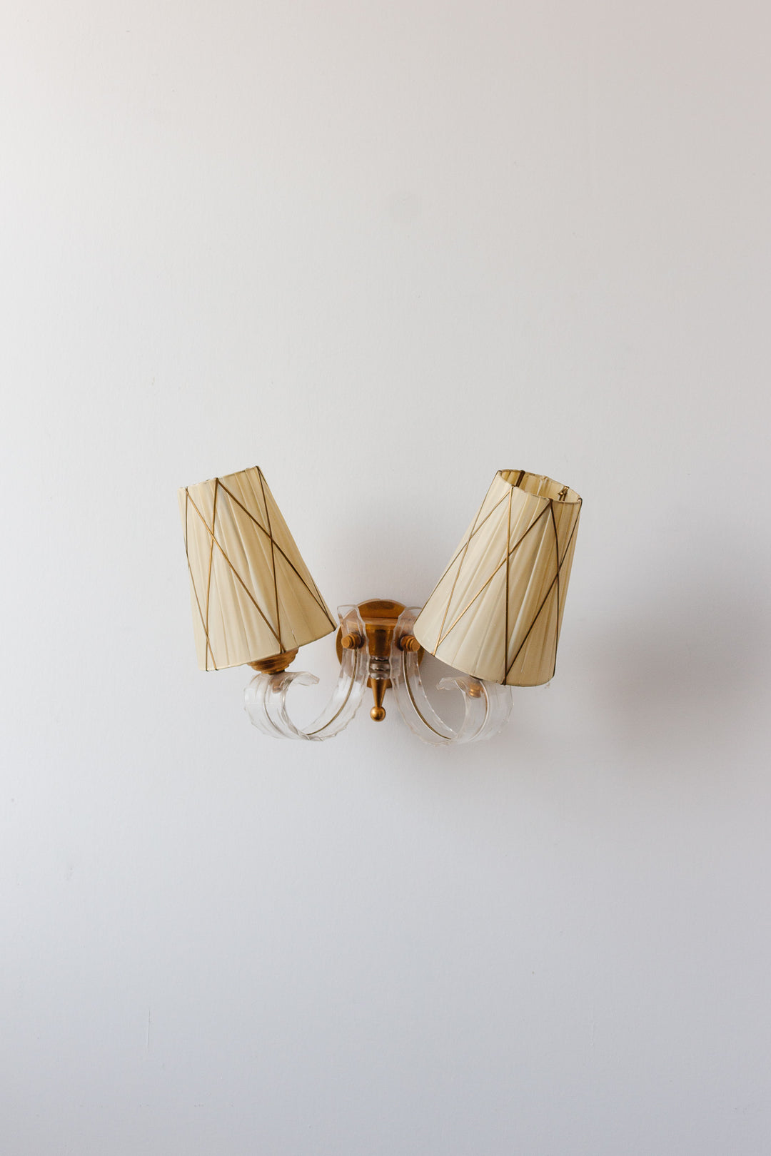 midcentury wall sconce, in the style of Jules Leleu