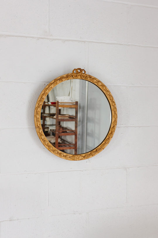 vintage Italian plaster mirror with bow cornice