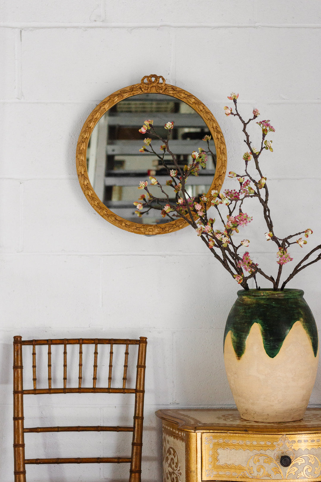 vintage Italian plaster mirror with bow cornice