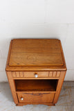 pair of vintage French art deco carved oak nightstands