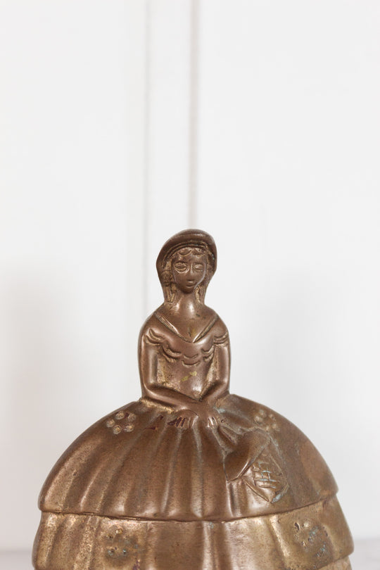 Vintage french brass “bell lady”