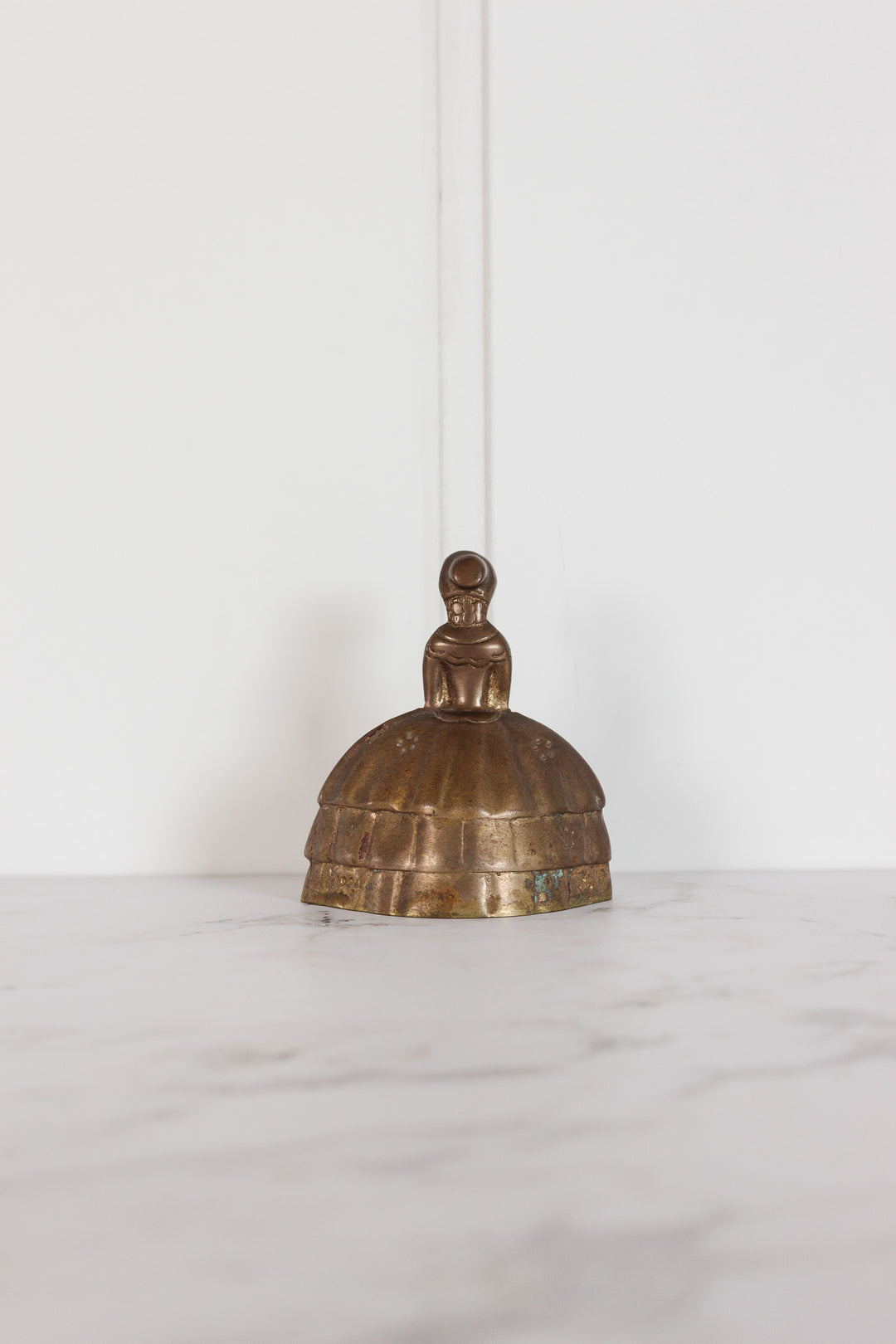 Vintage french brass “bell lady”