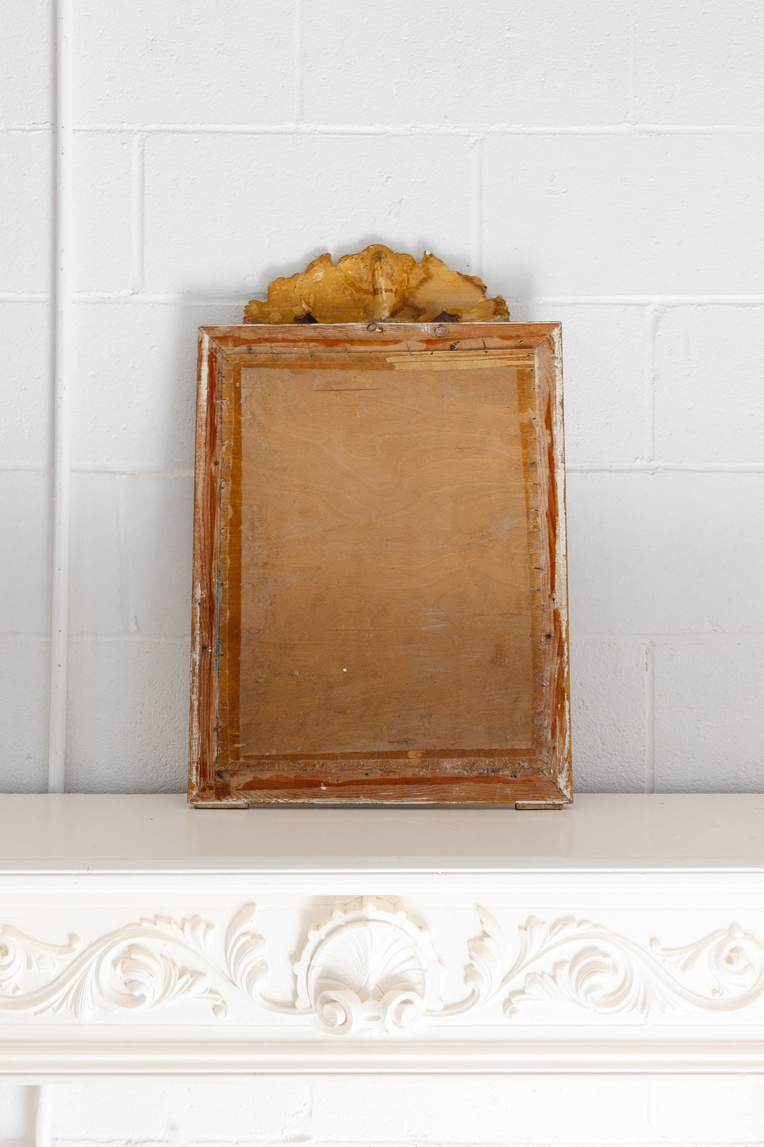 vintage French gilt wood mirror with flower basket cornice