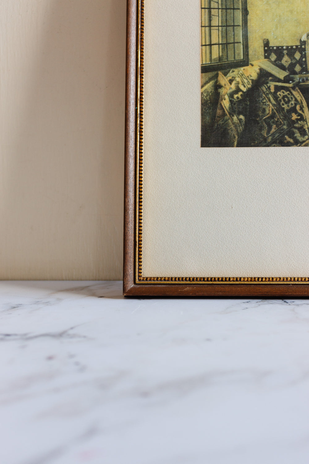 Interior with a woman weighing gold coin by Pieter de Hooch