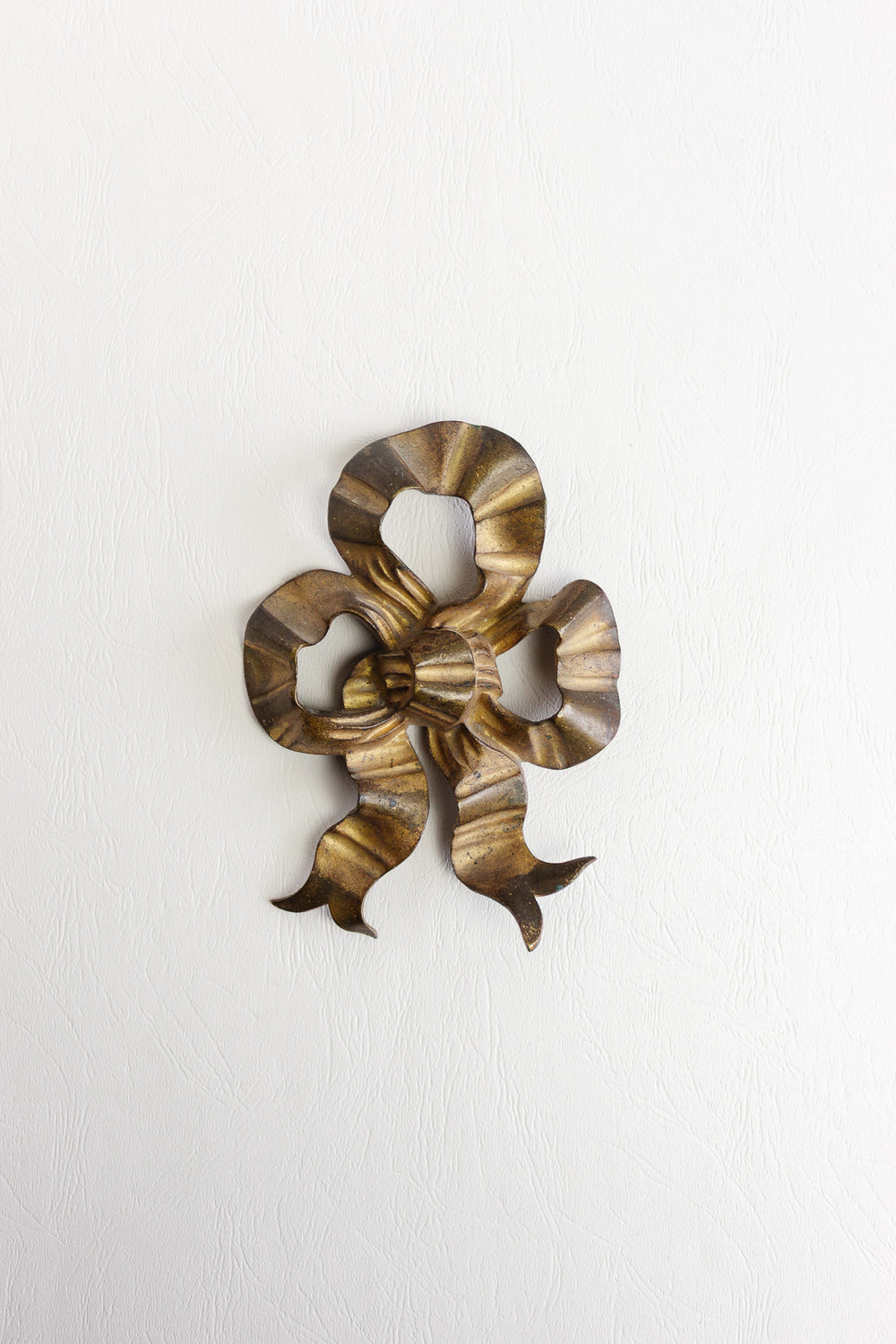 antique french oversized brass bow