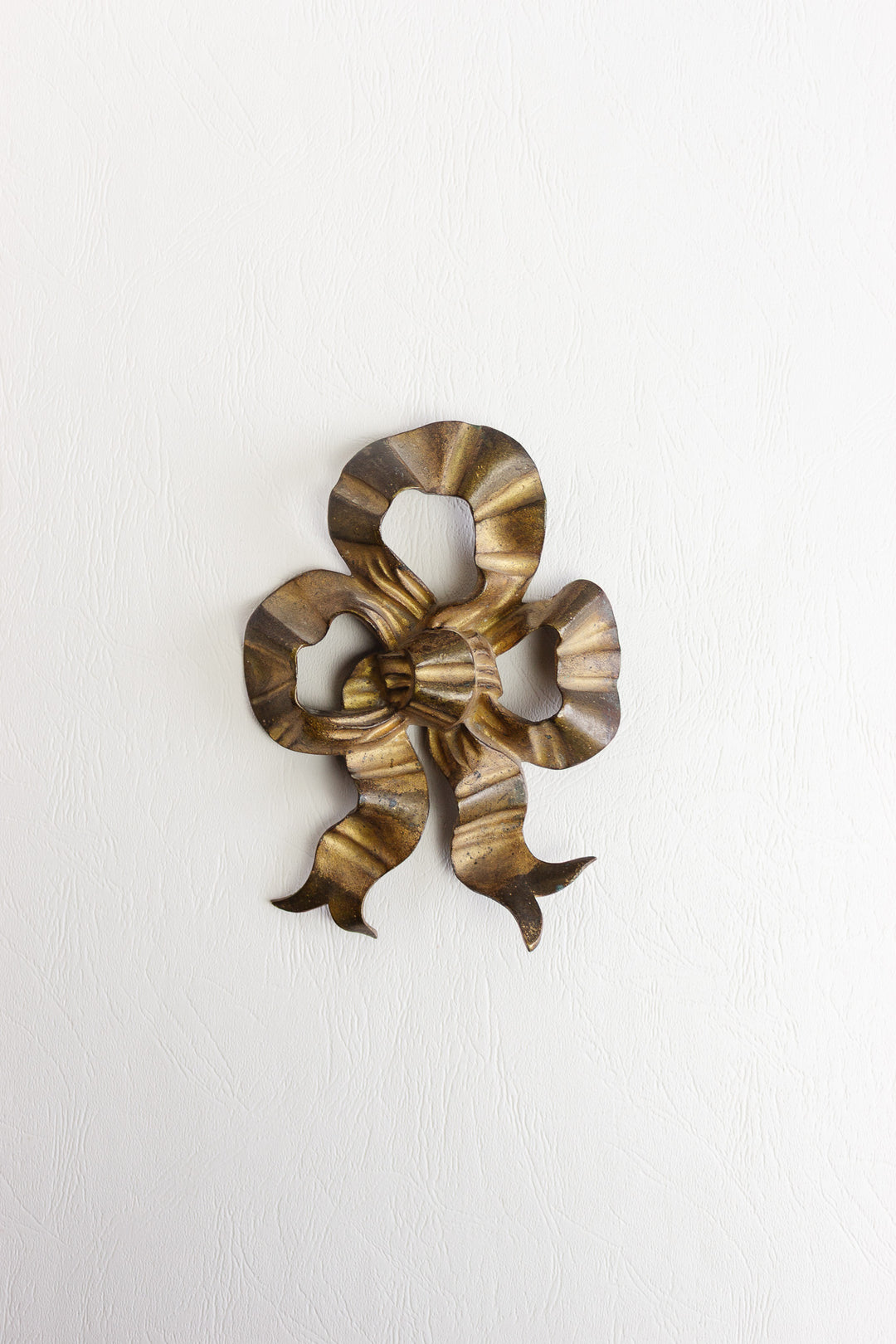 antique french oversized brass bow