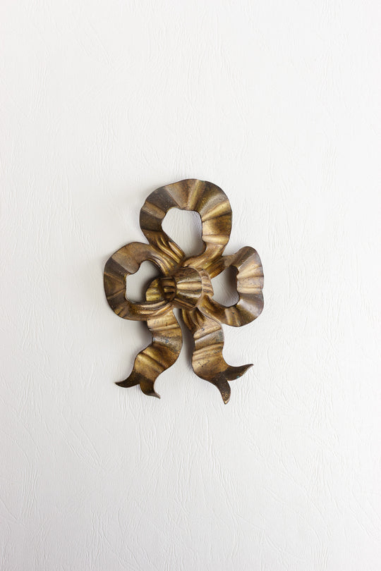 antique french oversized brass bow